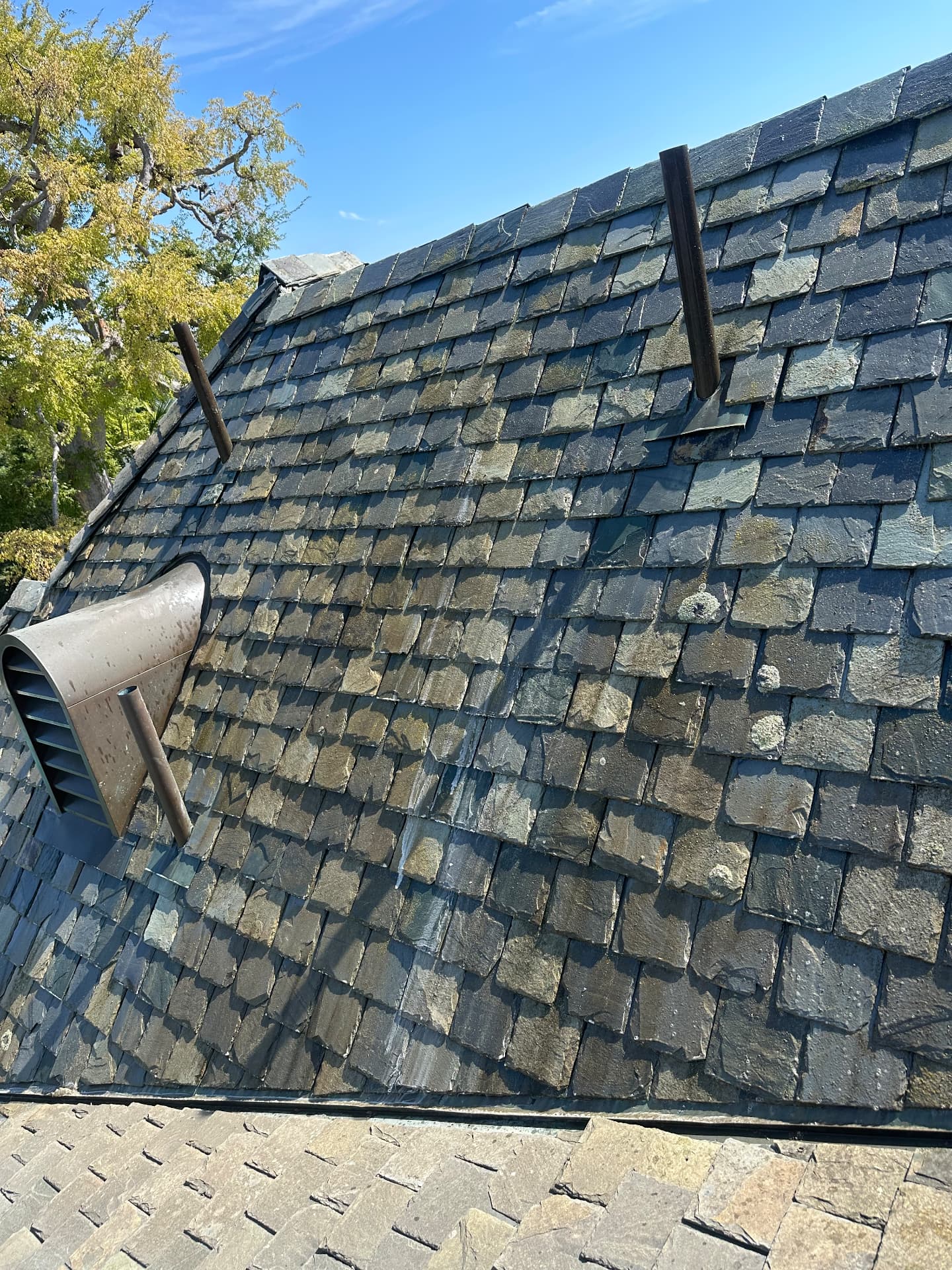 Natural slate roof wash before