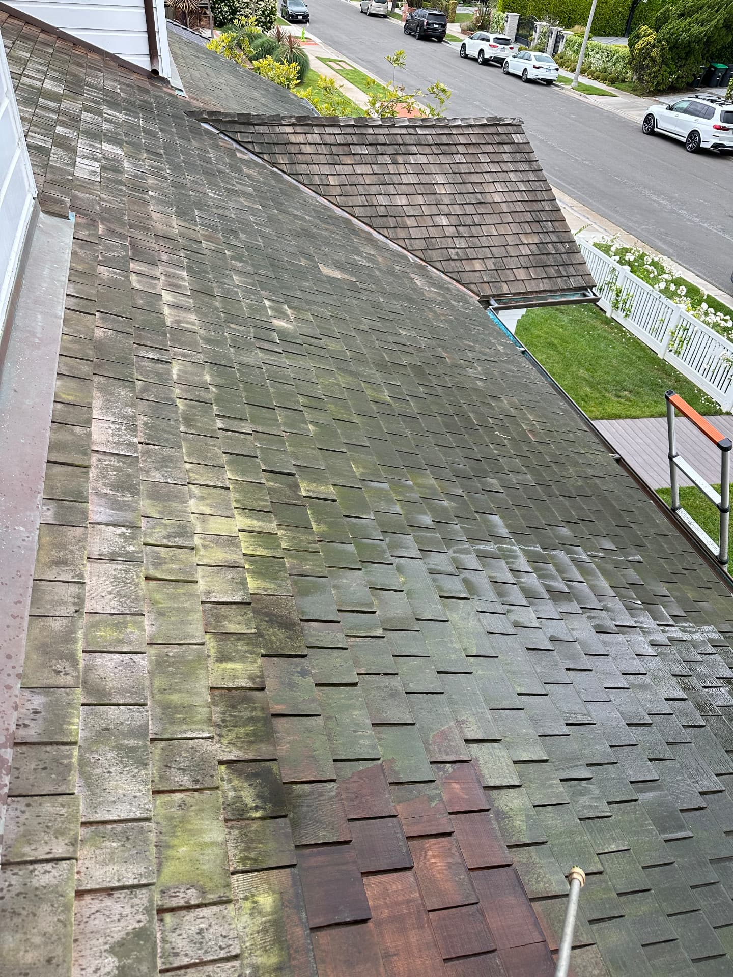 Cedar shake roof washing before